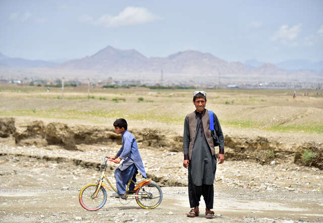 16-year-old Naiko and another boy in Killa Malik Abdul Rehman Village in Chaman, Balochistan.